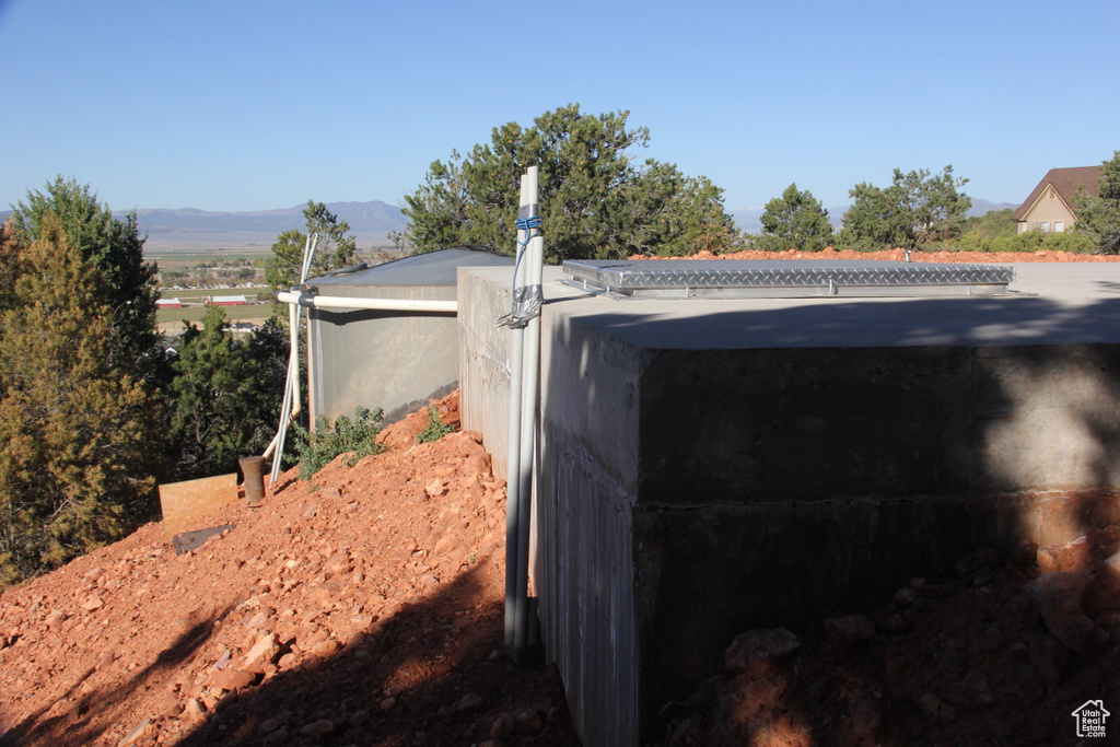 Entry to storm shelter featuring a mountain view
