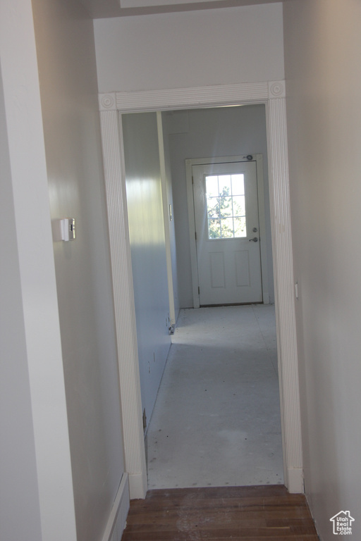 Corridor featuring hardwood / wood-style floors