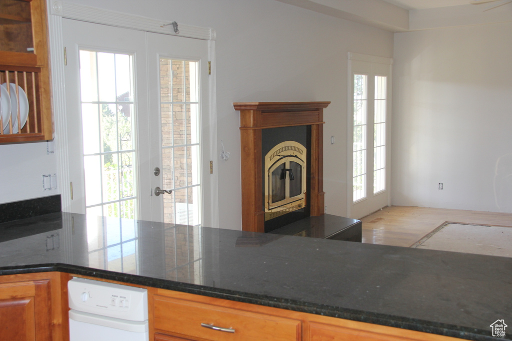 Kitchen featuring light wood-type flooring and french doors