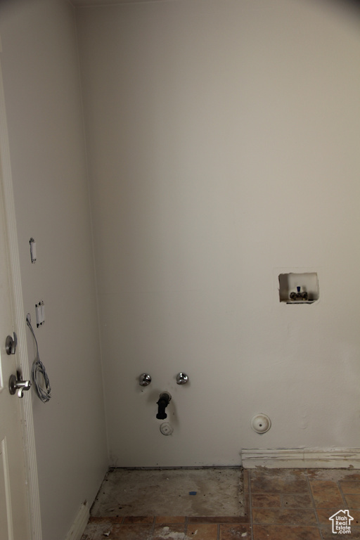 Laundry area with washer hookup and hookup for a gas dryer