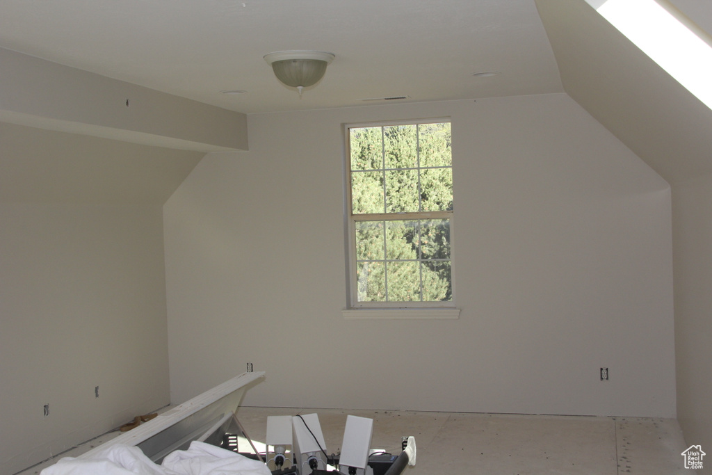 Bonus room featuring a skylight