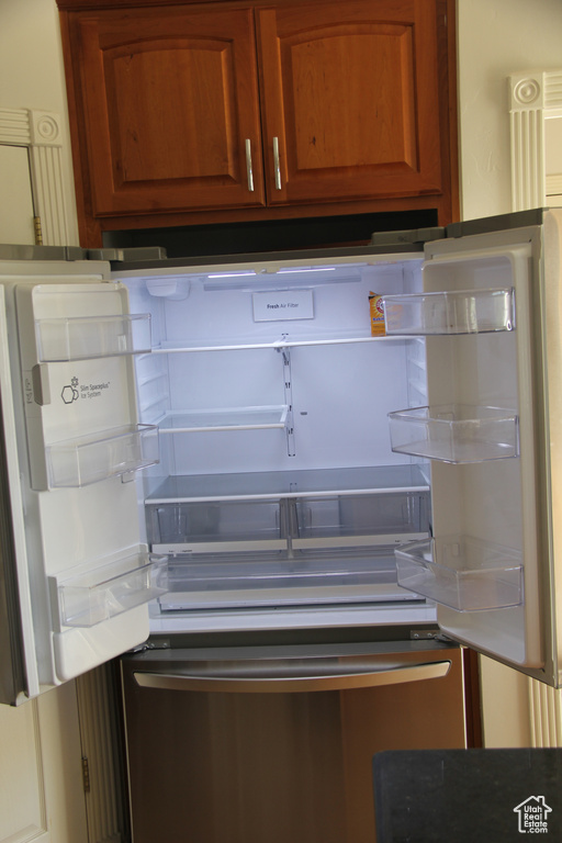 Room details featuring refrigerator