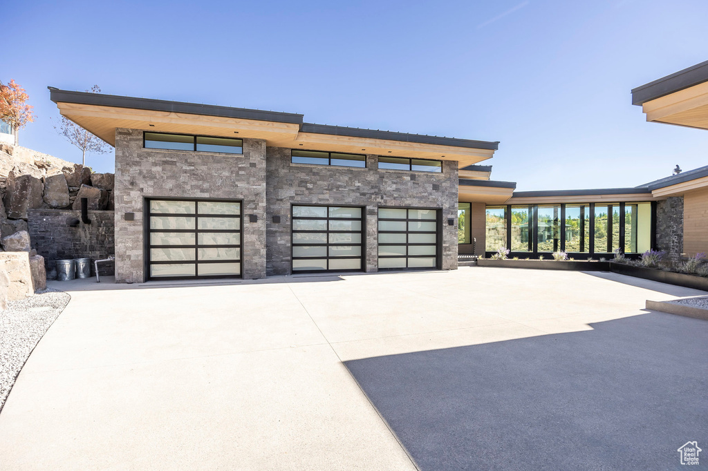 Garage featuring driveway