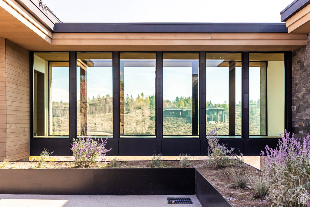 Exterior space featuring a sunroom