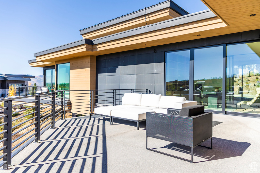View of patio / terrace with an outdoor hangout area and a balcony