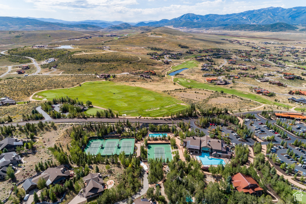 Bird's eye view of a golf club and a water and mountain view