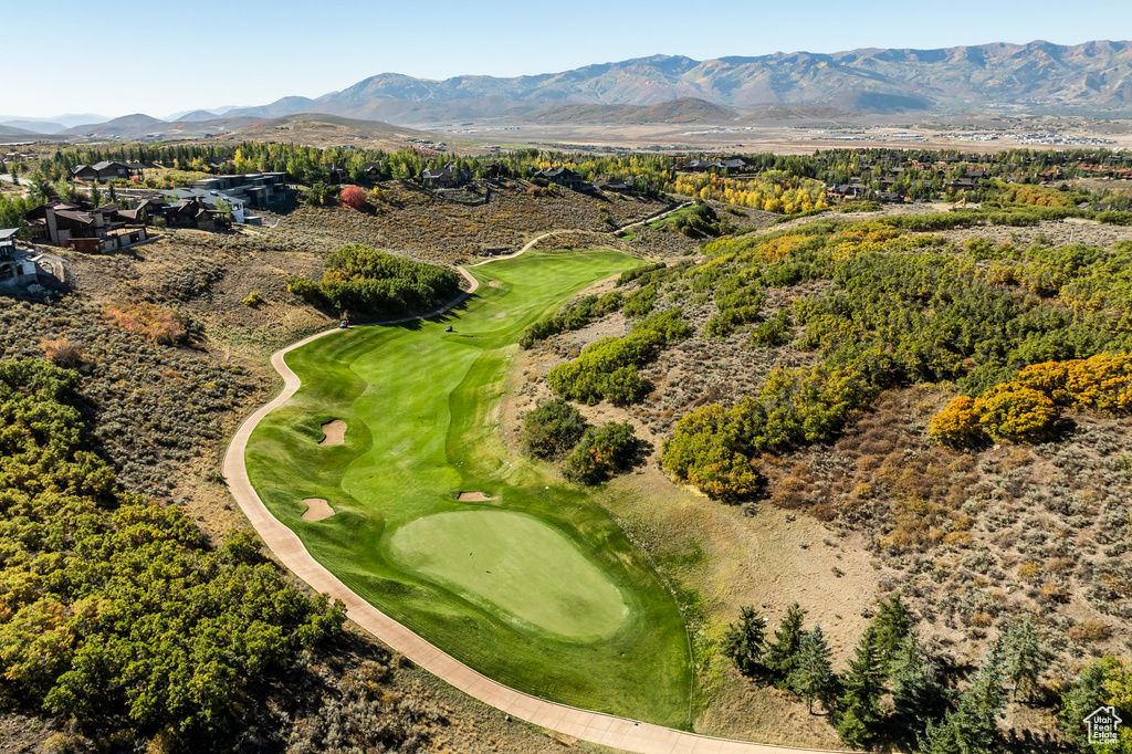 Aerial view of a local golf course and mountains