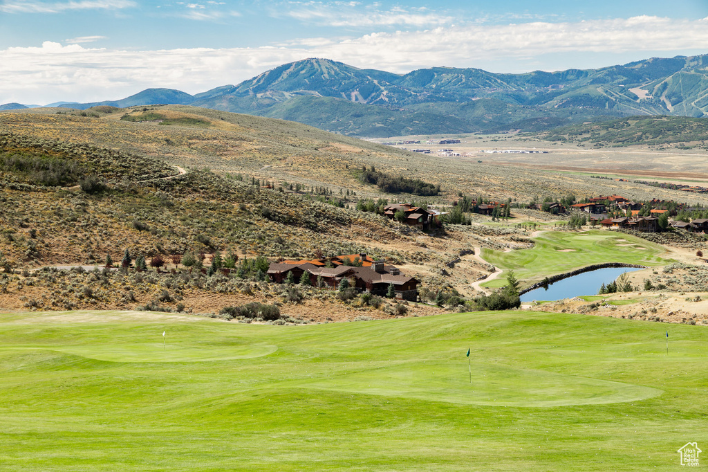 View of mountain backdrop featuring a golf club