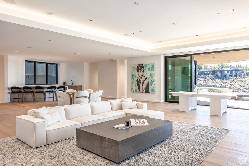 Living area with light wood-style flooring