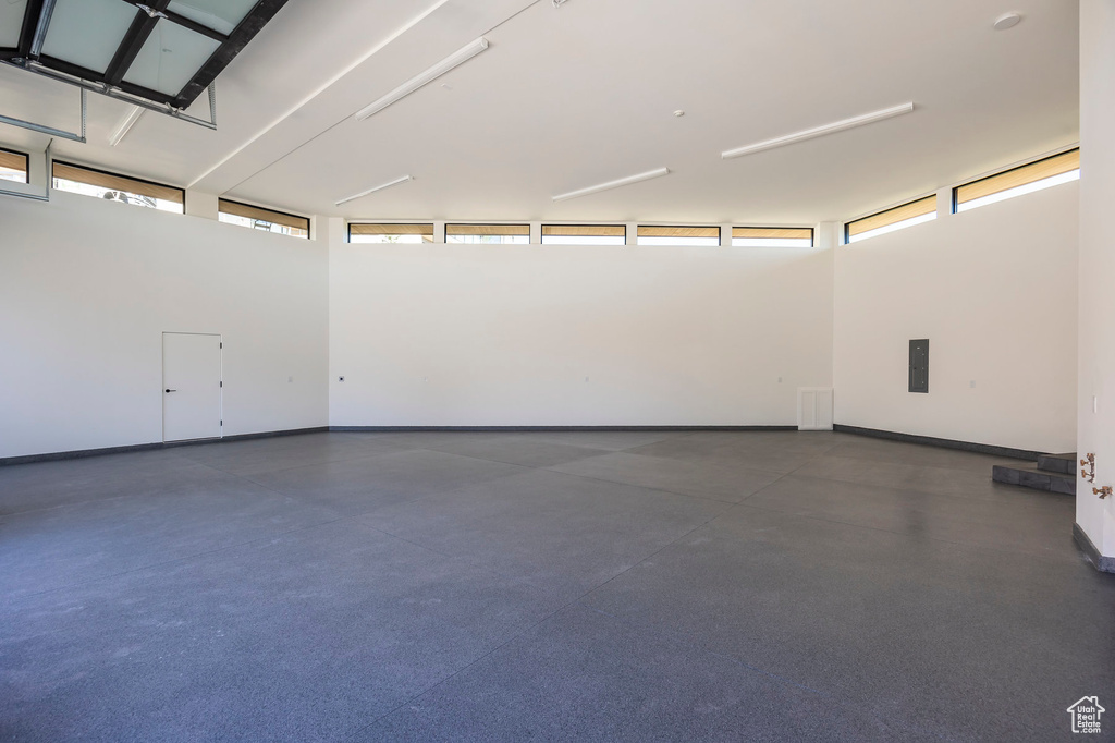 Garage featuring baseboards