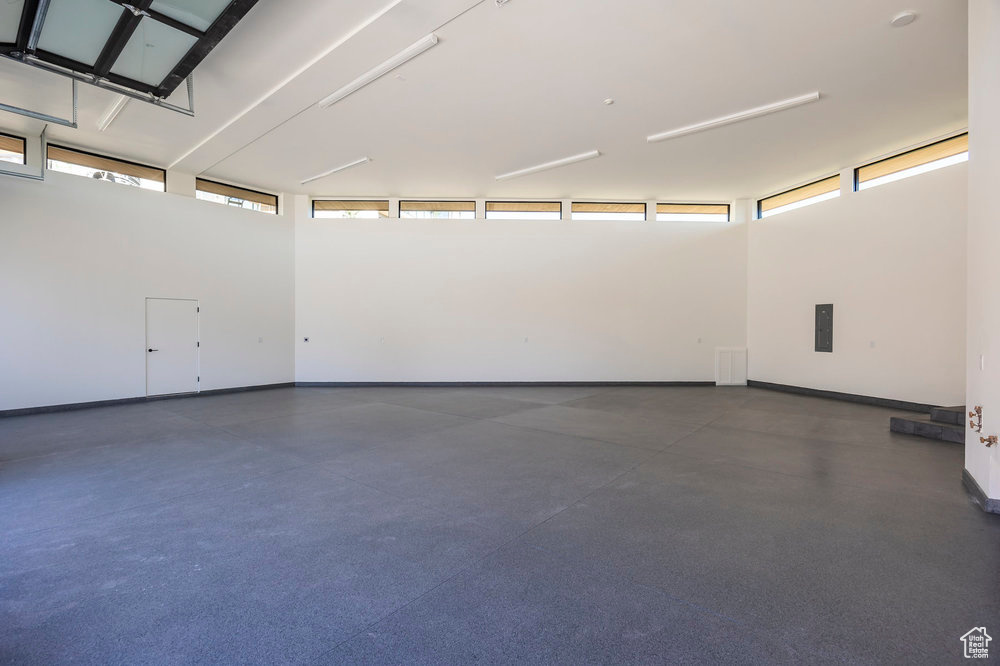 Garage featuring baseboards