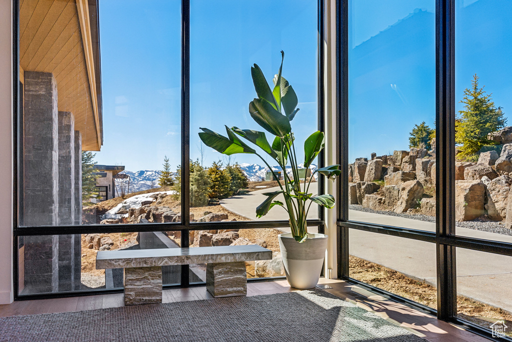 Unfurnished sunroom featuring healthy amount of natural light