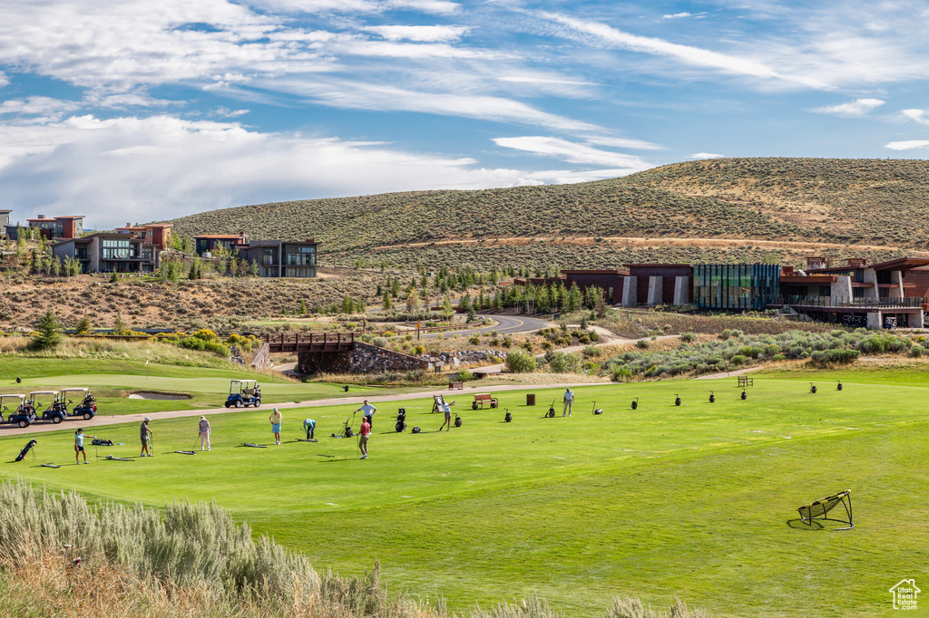 Surrounding community featuring a mountain view and view of golf course