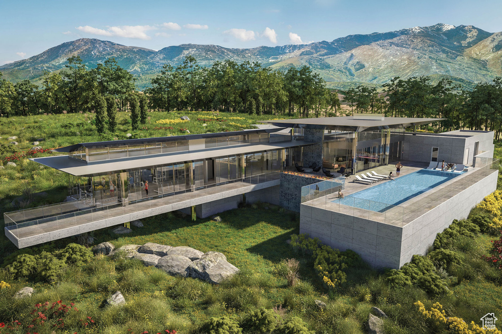 Back of house with a mountain view