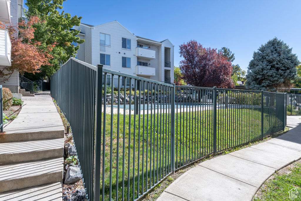 Exterior space featuring a yard