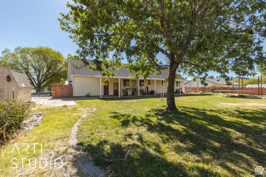 Exterior space with a yard