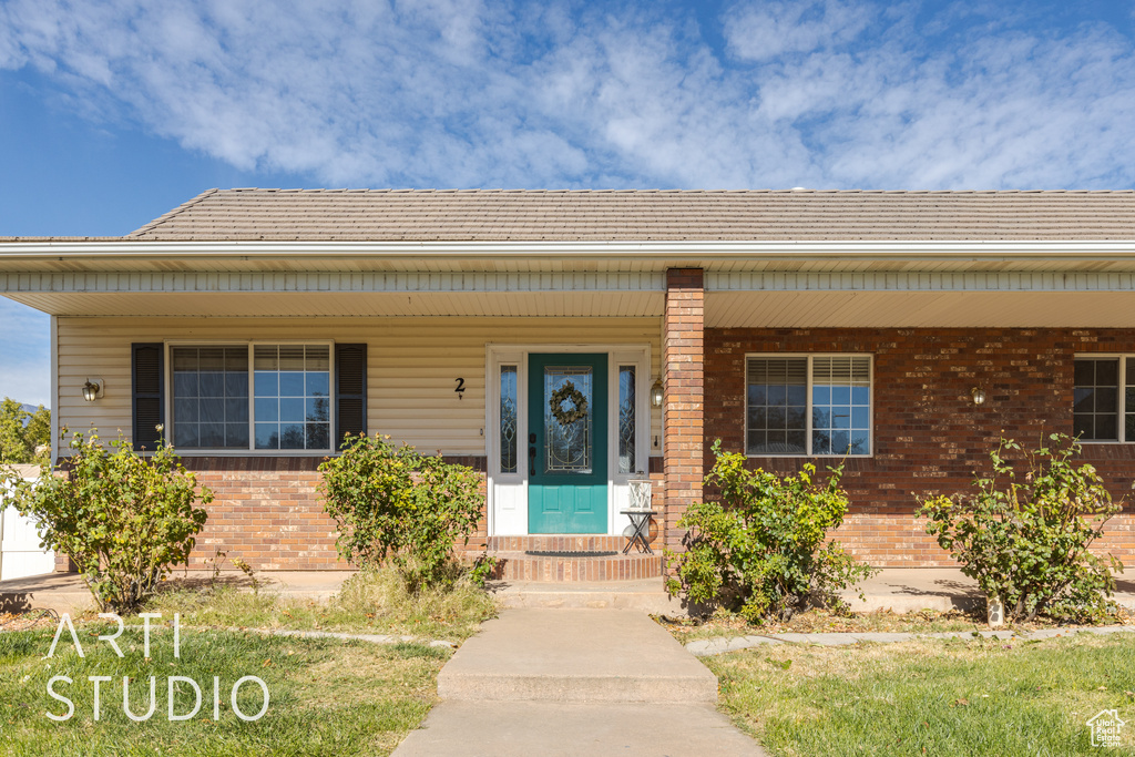 View of front of home featuring covered porch