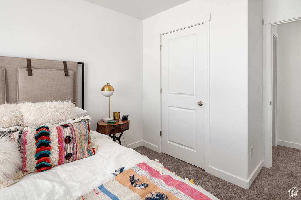 Bedroom with carpet flooring