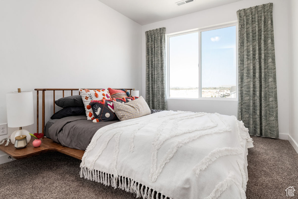 Bedroom featuring carpet flooring
