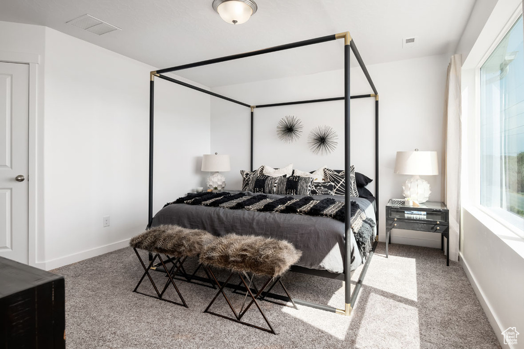 View of carpeted bedroom