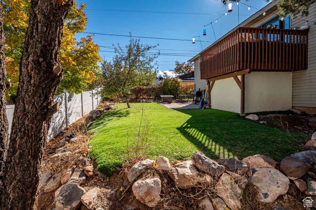 View of yard with a patio