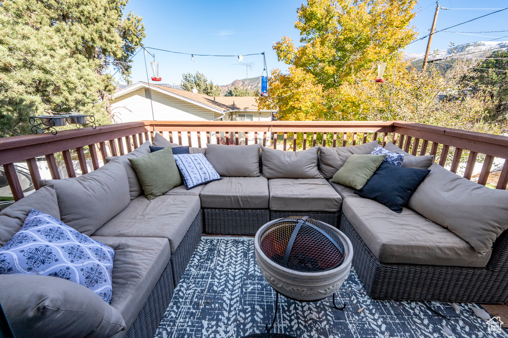 Deck with an outdoor living space