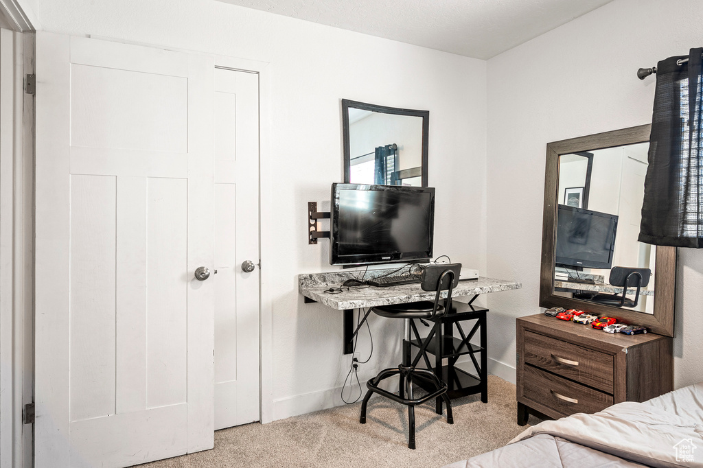 View of carpeted bedroom