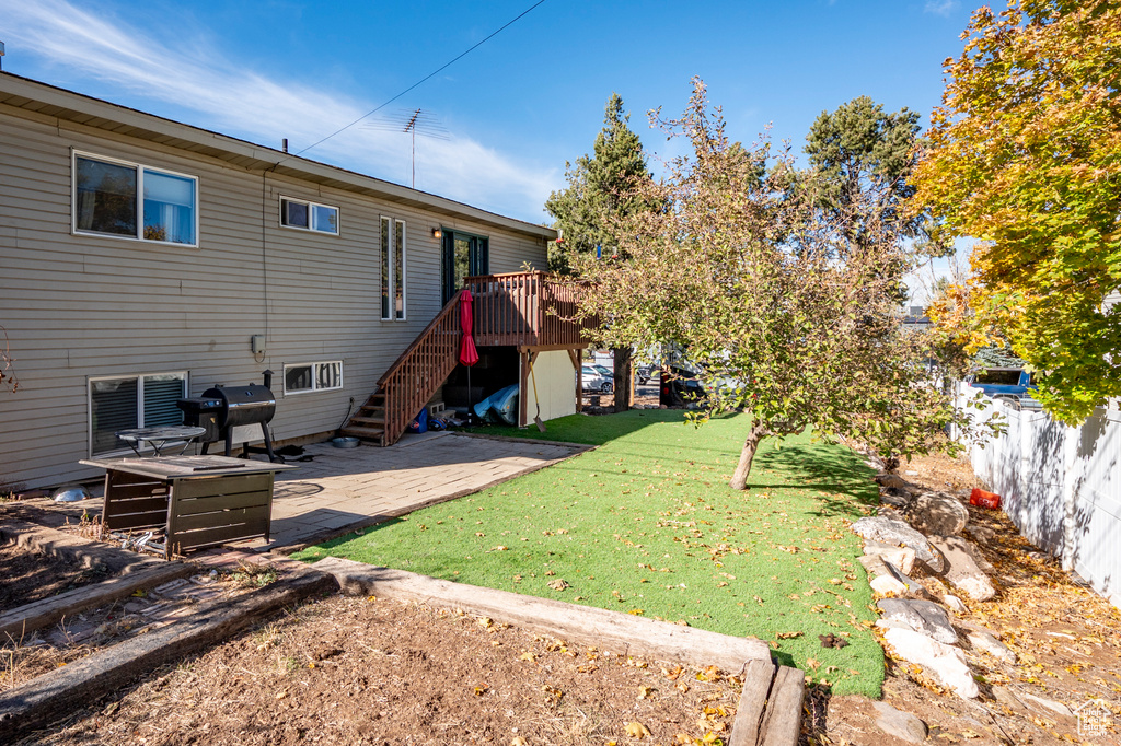 View of yard featuring a deck