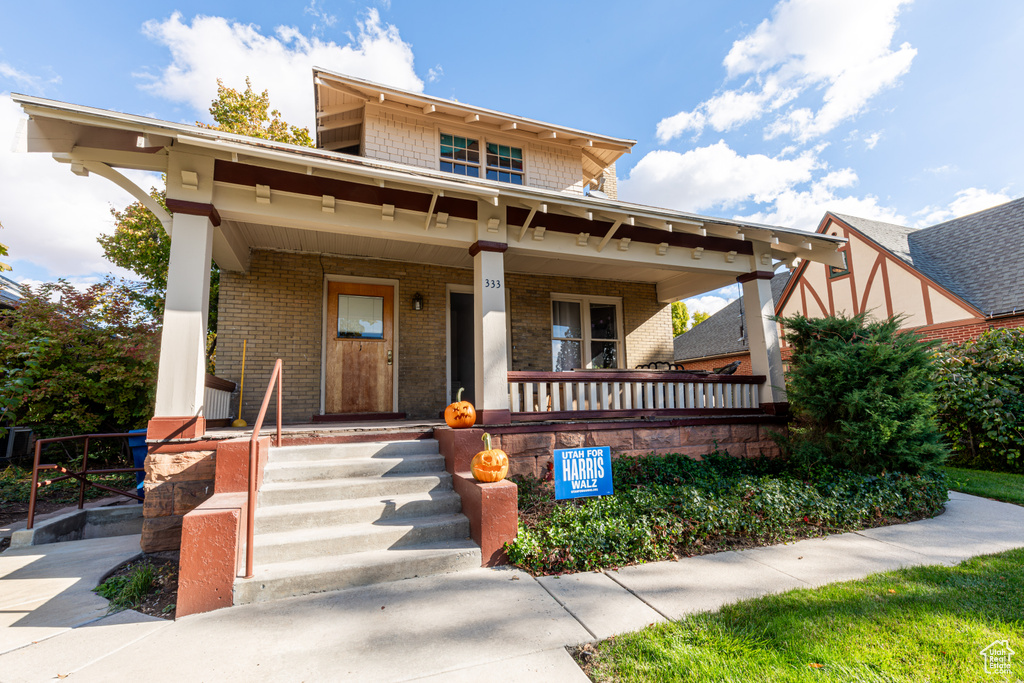 View of front of property featuring covered porch