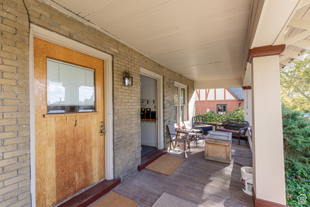 View of patio with a porch