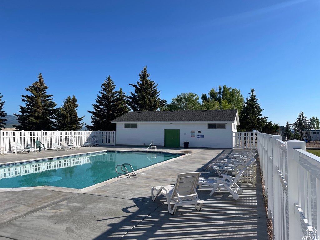 View of pool with a patio