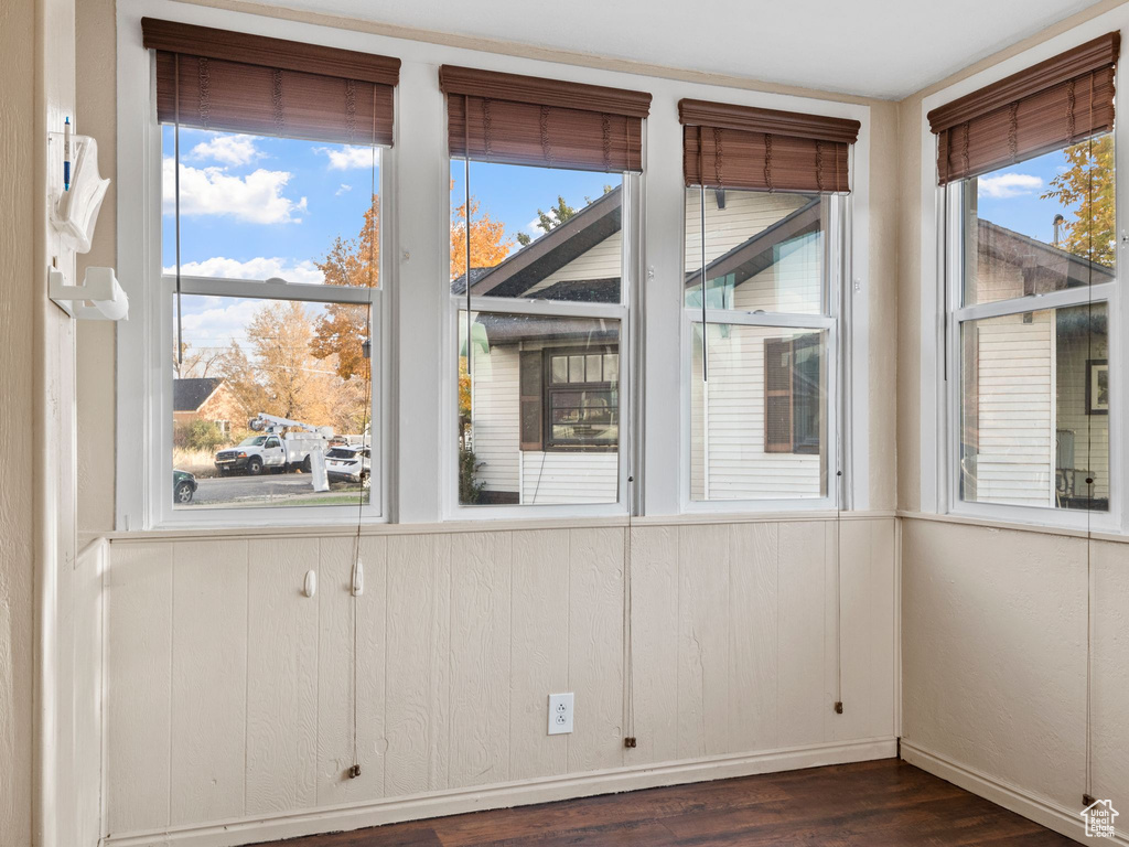 Interior space featuring dark hardwood / wood-style floors