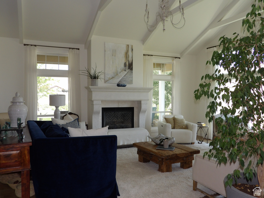 Living room with lofted ceiling and carpet