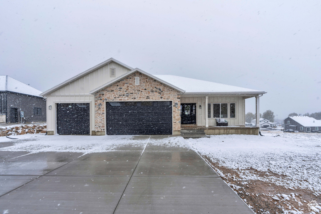 View of front of home featuring a garage