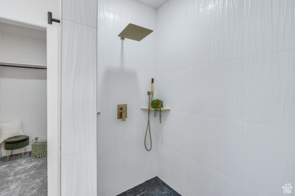 Bathroom with tiled shower