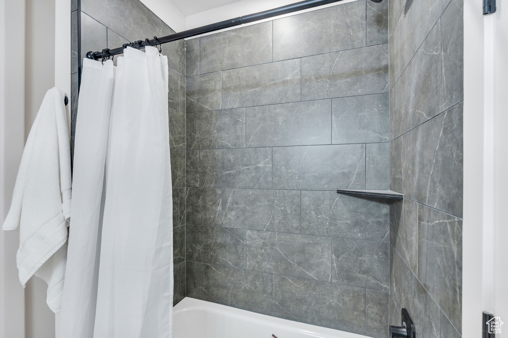 Bathroom featuring shower / bath combo