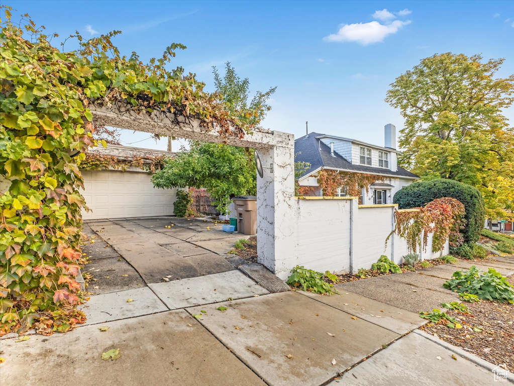 View of front of property featuring a garage