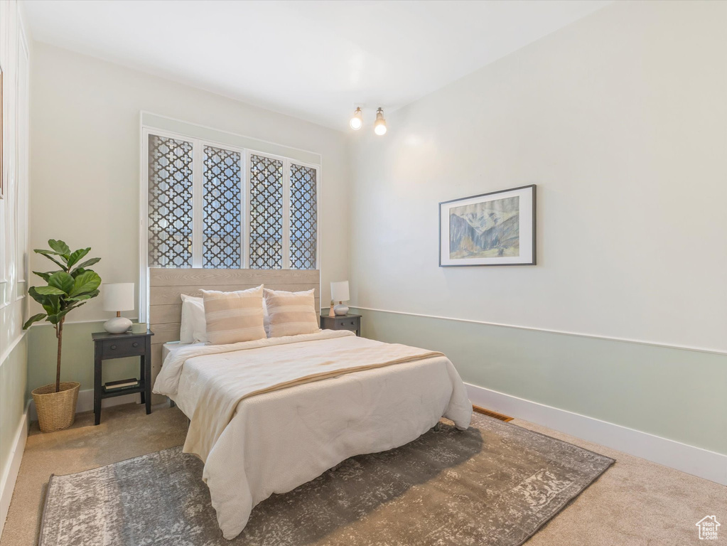 View of carpeted bedroom