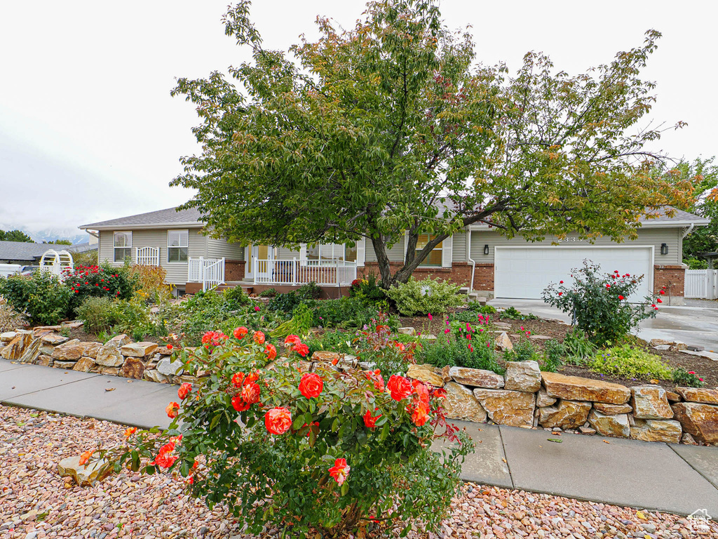 Obstructed view of property featuring a garage