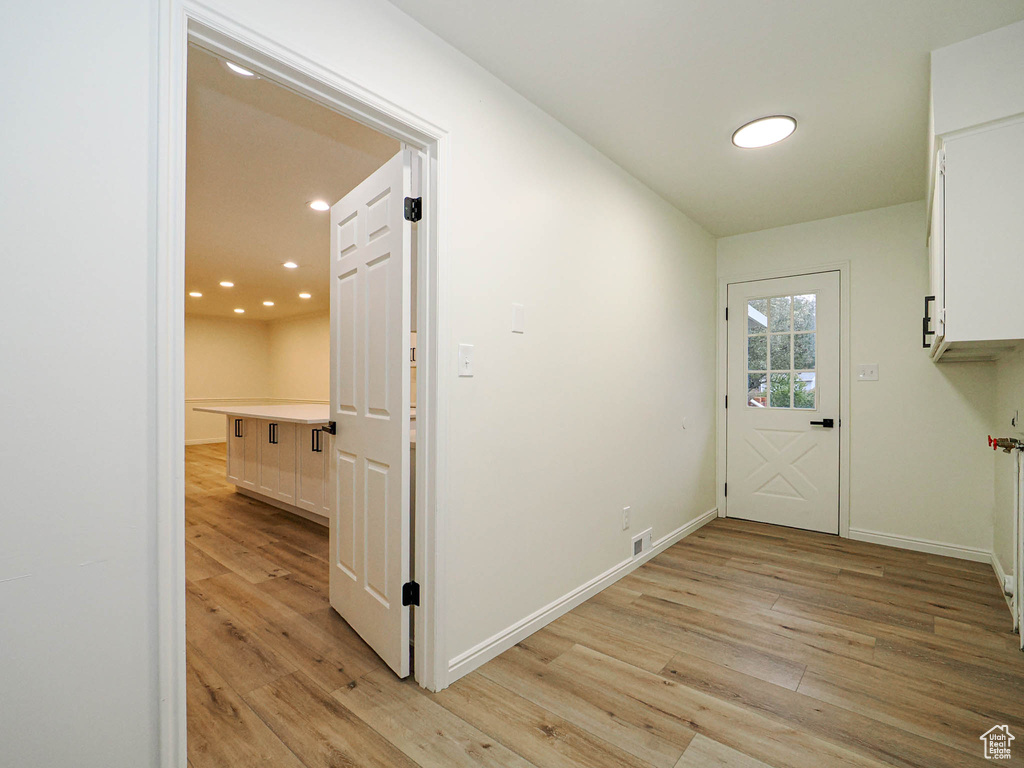 Interior space with light hardwood / wood-style flooring