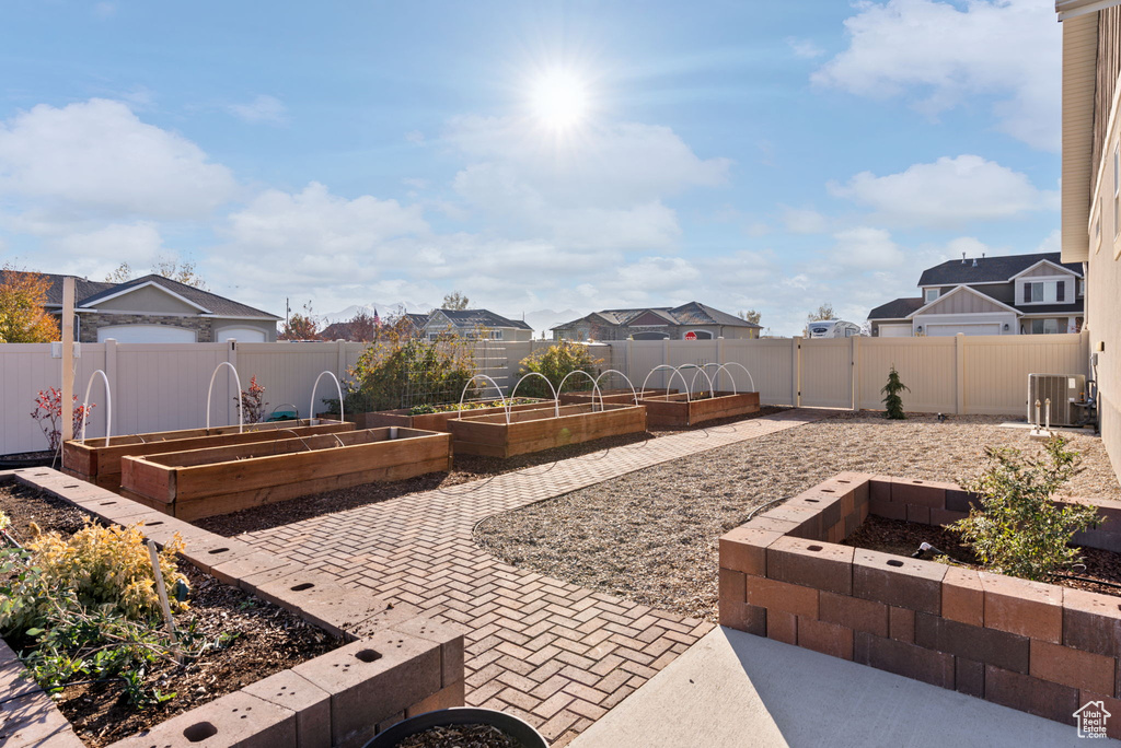 View of patio featuring cooling unit