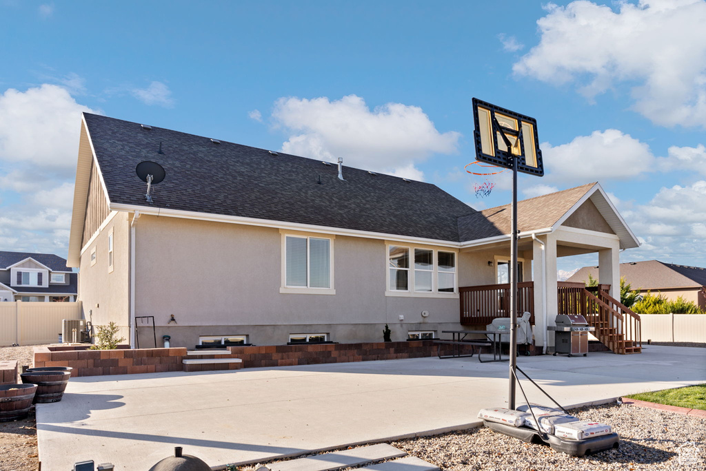 Rear view of house featuring a patio area