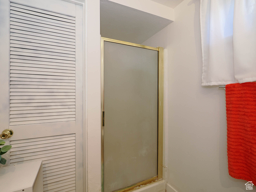 Bathroom with an enclosed shower