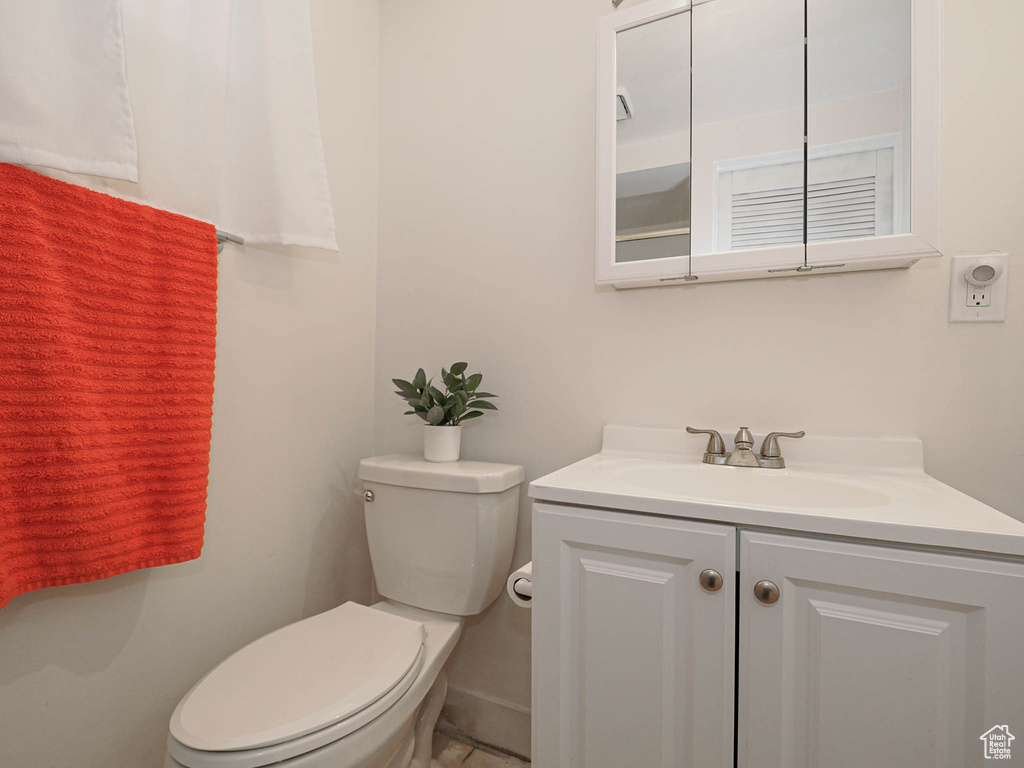 Bathroom with vanity and toilet