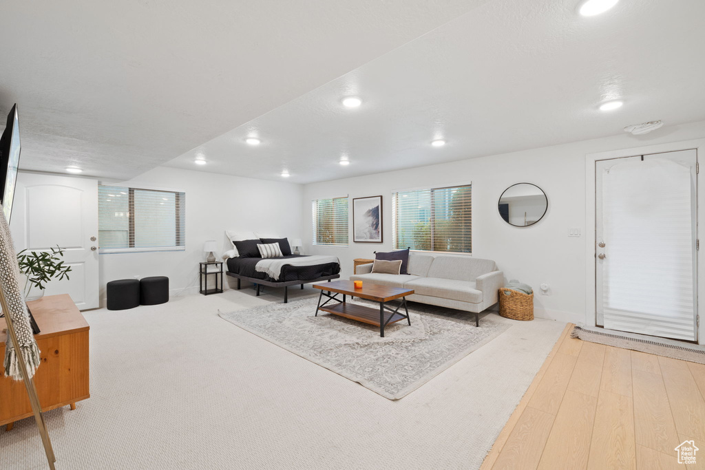 Living room with wood-type flooring