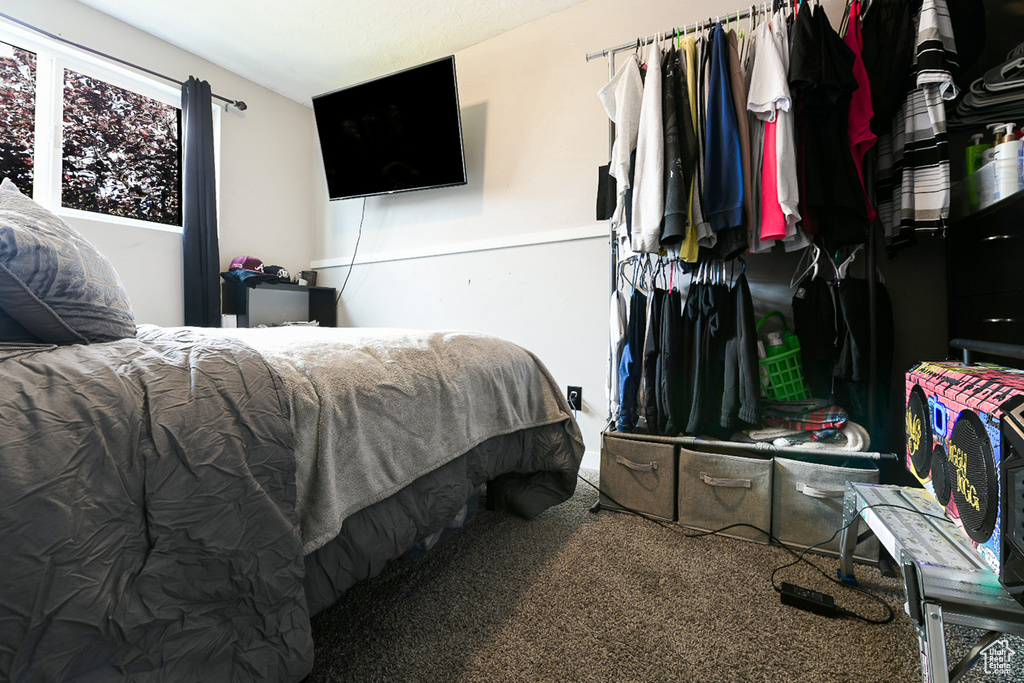 Bedroom with carpet flooring