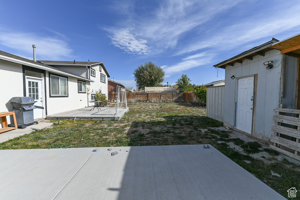 View of yard with a patio area