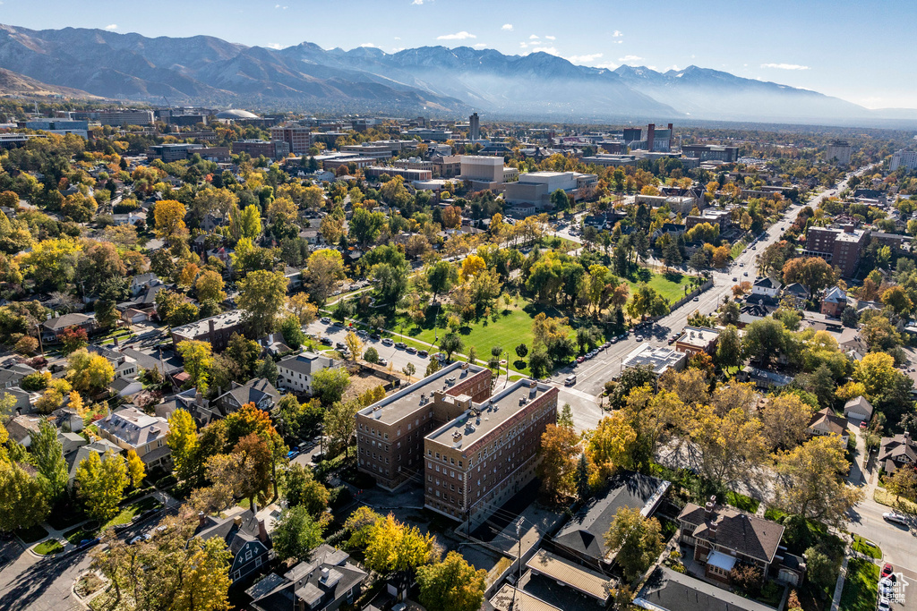 Birds eye view of property with a mountain view