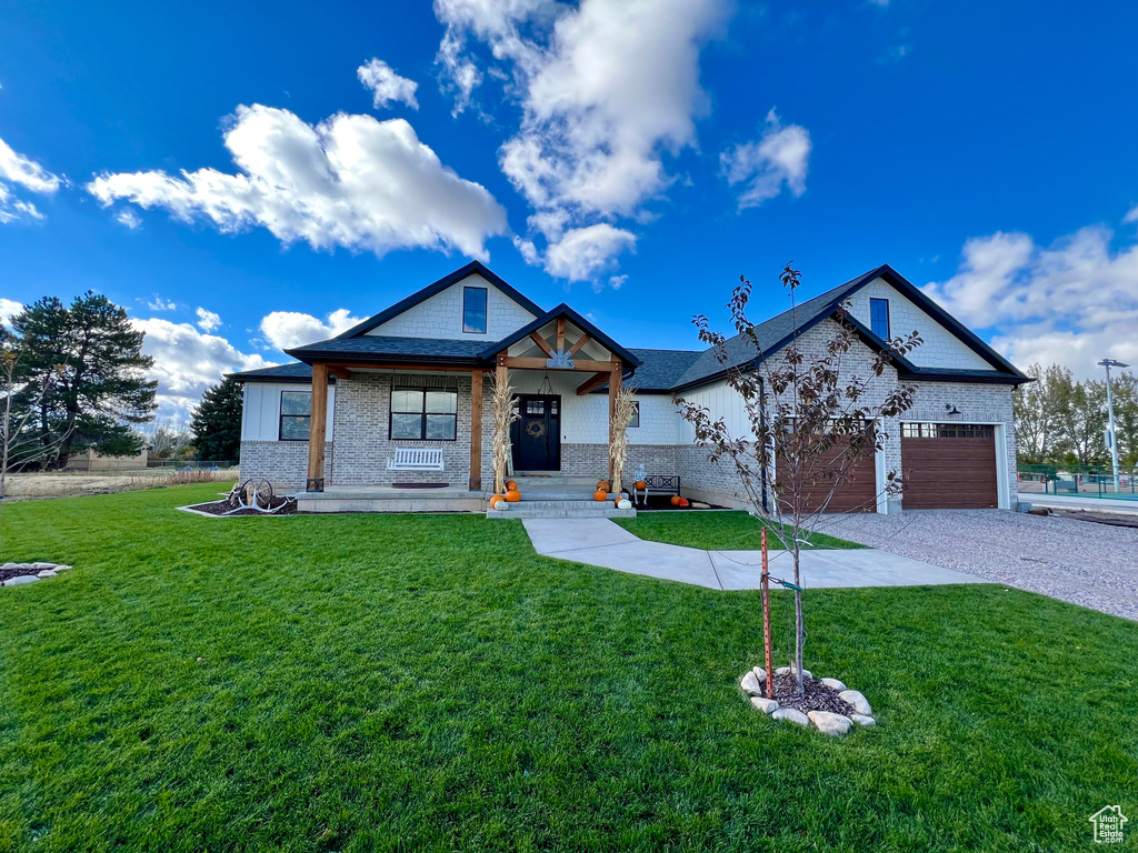 Craftsman-style house with a front lawn