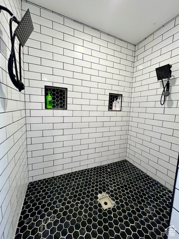 Bathroom with tiled shower